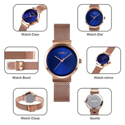 RELOJ SKMEI 1595 ORO ROSA FONDO AZUL CORREA ACERO PARA MUJER